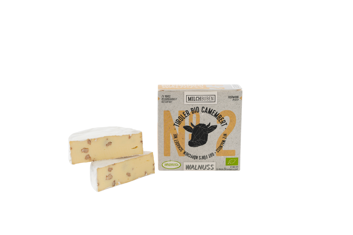 Milchbuben Tiroler Bio Camembert Walnuss aufgeschnitten und im Karton