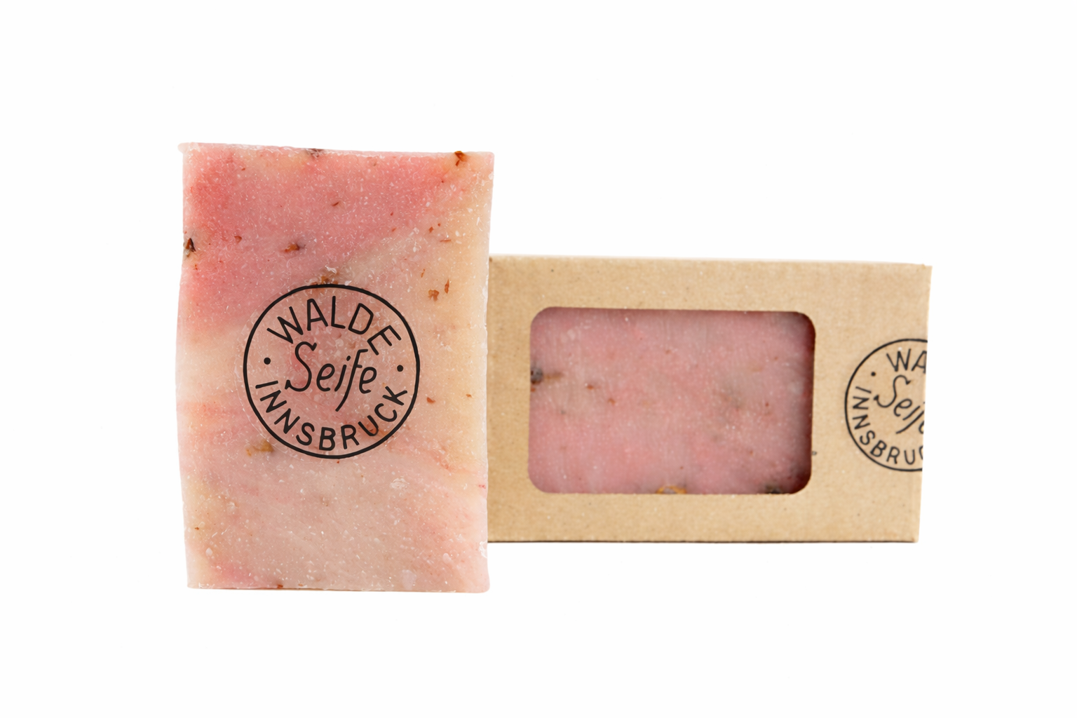 Handgeschöpfte Seife von Walde aus Innsbruck unverpackt und im Karton Sorte Rose mit Rosenblüten